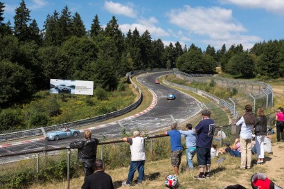 Spectators watch the cars in action at the Nurburgring. Credit Glen Pearson