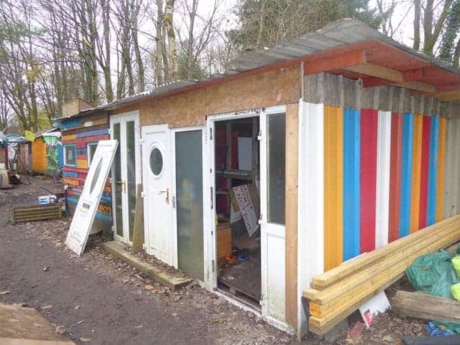 A new common room being constructed at the peace camp.