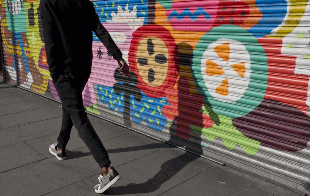 Man walking in Brixton, London. Photo: Adobe Stock