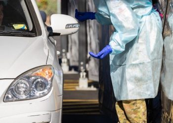 An ADF member assists at a border checkpoint. Photo credit: Australian Army Facebook page