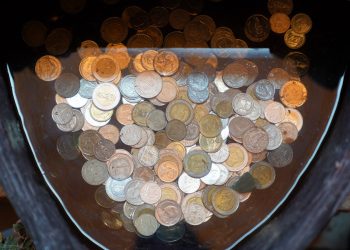 Cash is changing hands less frequently