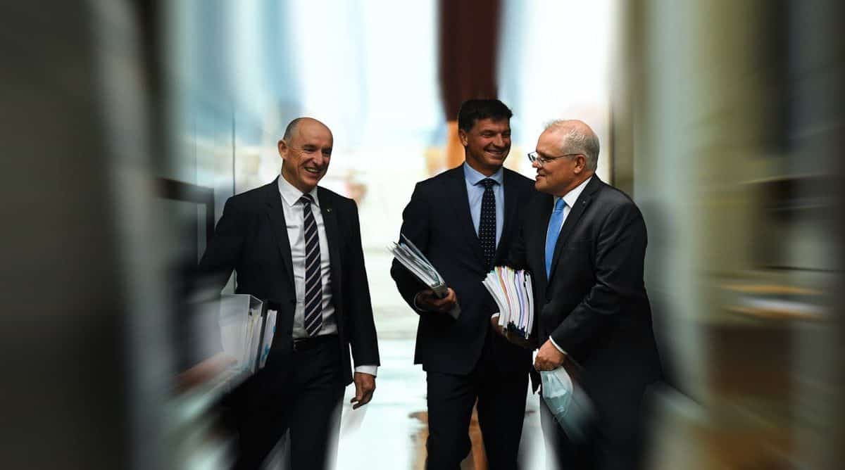 Ministers Stuart Robert, Angus Taylor and Prime Minister Scott Morrison arriving at question time. Lukas Coch/AAP