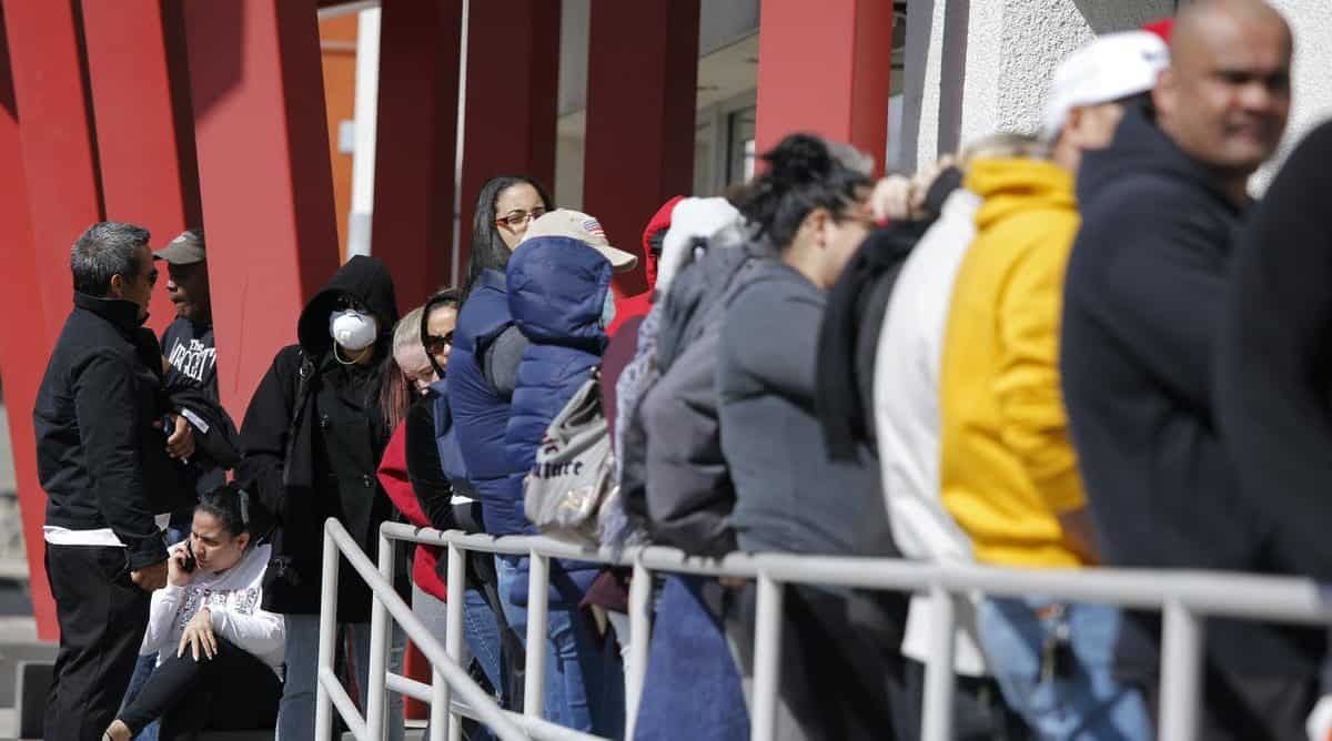 The number of people seeking jobless benefits has soared during the pandemic. AP Photo/John Locher
