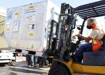 Russian Sputnik V vaccines arriving at Silvio Pettiross airport in Ciudad Luque, Paraguay, February 2021. EPA-EFE/Nathalia Aguilar