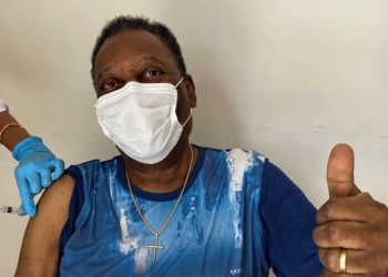 Brazilian football star Pele getting the COVID vaccine in Sao Paulo. Advice of Pele/Handout/EPA