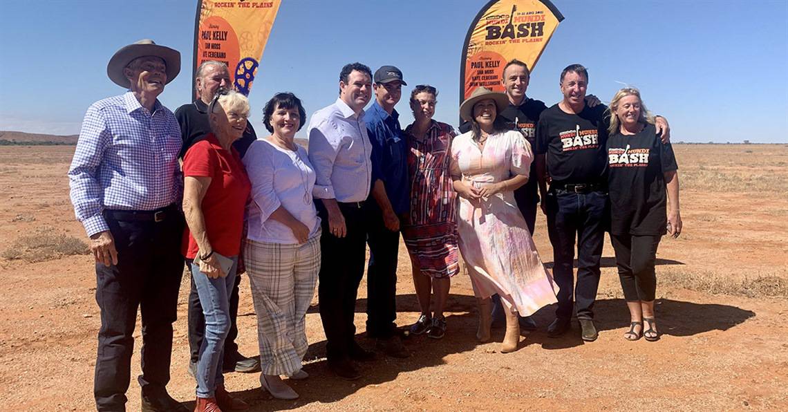Broken Hill Mayor Darriea Turley,  NSW tourism minister Stuart Ayres, and Kate Ceberano joined event organisers on Mundi Mundi plains to launch the Bash. Photo credit: City of Broken Hill