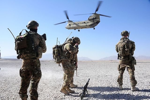 Australian soldiers prepare to board a US helicopter in Afghanistan in 2013. Photo credit Wikimedia Commons