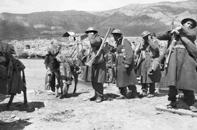 Infantrymen from the Australian 2/2nd Battalion after crossing the Aliakmon River on ferries during their retreat from Northern Greece following the German invasion. Photo credit: Australian War Memorial ID Number: 007844