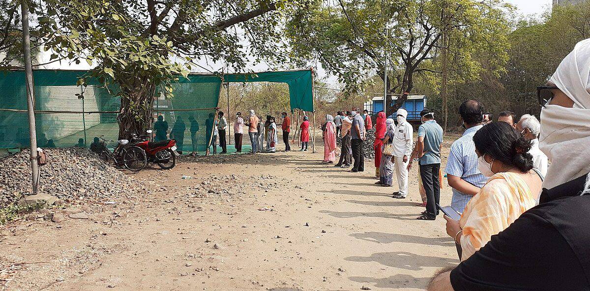 A covid vaccination queue in India earlier this month. Photo credit: Ganesh Dhamodkar via Wikimedia Commons