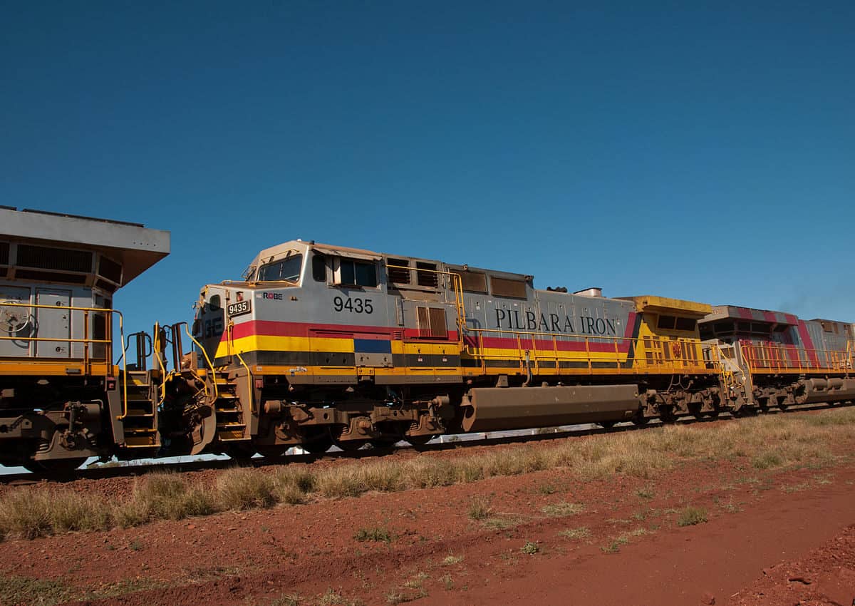 An iron ore train in the Pilbara region. Photo credit: Graeme Churchard via Wikipedia