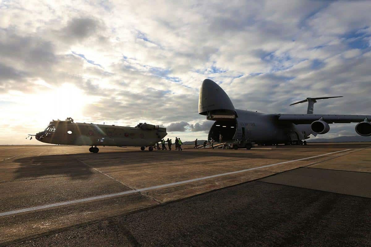 A new CH-47F Chinook heavy-lift helicopter is unloaded from a United Stated C-5 Galaxy at RAAF Base Townsville, Queensland. Photo credit: Trooper Lisa Sherman, ADF