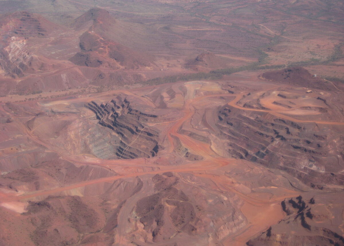 An aerial view of open-cast mining in the Pilbara region of WA. Photo credit: Calistemon via Wikipedia